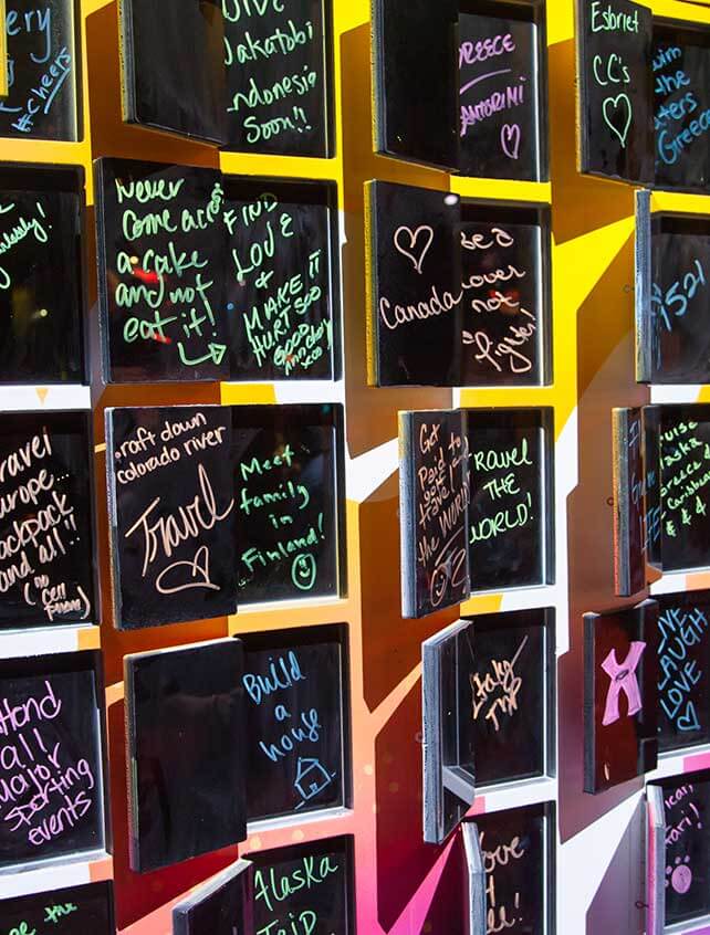 An installation of cards with handwritten messages.