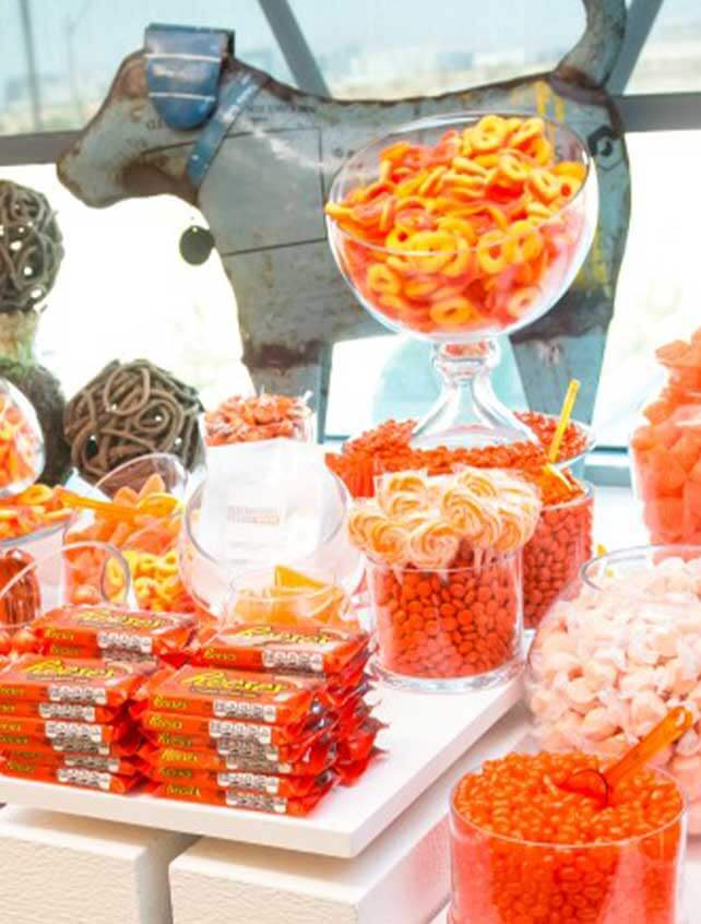 A large selection of candies arranged on a table.